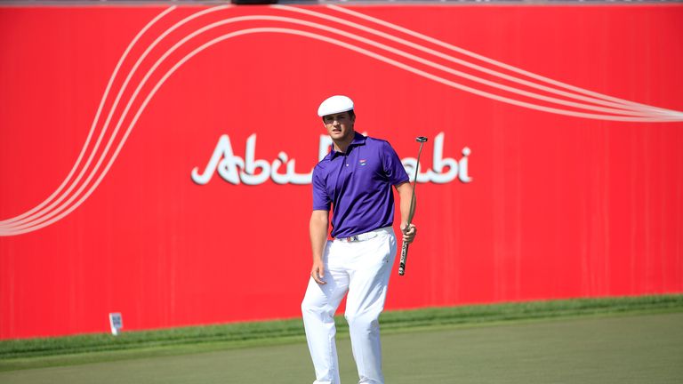 ABU DHABI, UNITED ARAB EMIRATES - JANUARY 21:  Bryson Dechambeau of The United States reacts as his eagle putt just misses at the par 5, 18th hole during t