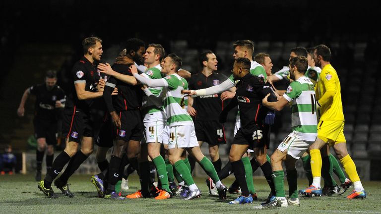 Players from both sides clash after Anthony Sweeney of Carlisle United scores his side's first goal