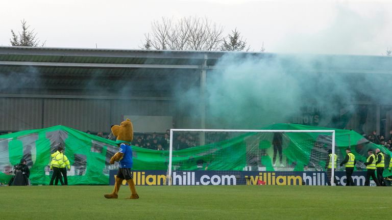 Flares set off in the stands before kick off during Celtic's Scottish Cup, Fourth Round match at Stair Park, Stranraer