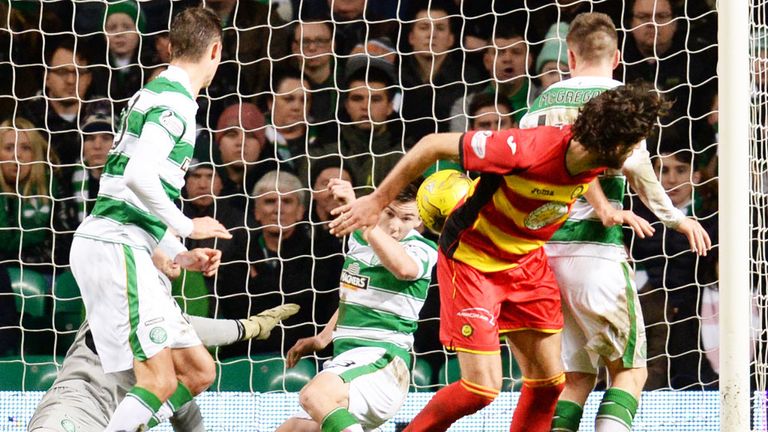 Celtic defender Kieran Tierney clears the ball off the line to deny Partick a goal