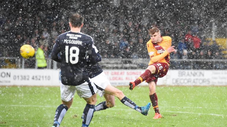 Motherwell's Chris Cadden (right) fires in the first goal of the game for his side 