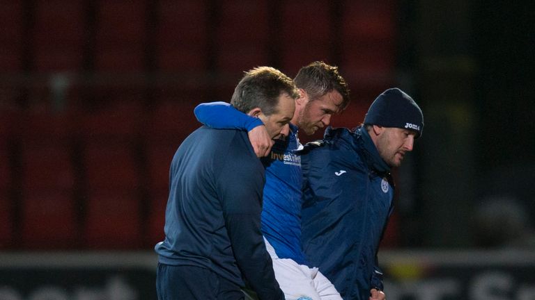 09/01/16 WILLIAM HILL SCOTTISH CUP n ST JOHNSTONE V KILMARNOCK (0-1) n MCDIARMID PARK - PERTH n St Johnstone's Chris Millar is lifted off after struggli