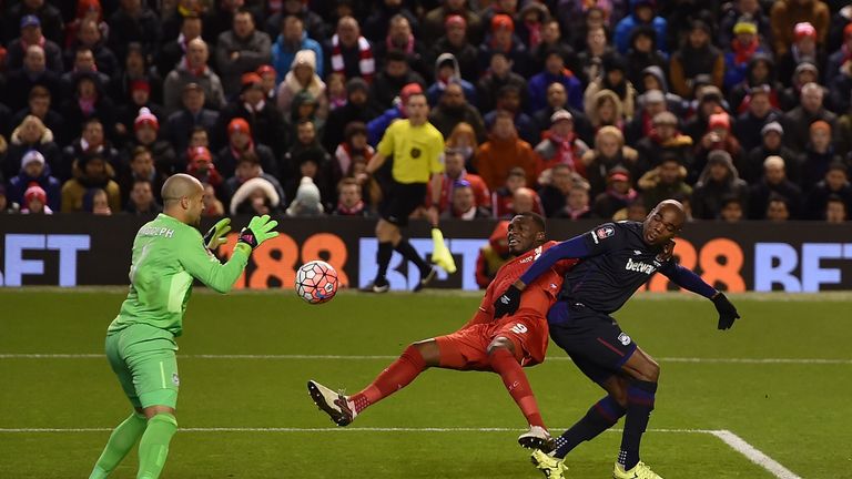 Christian Benteke of Liverpool is thwarted in his attempt at goal in the FA Cup fourth-round match against West Ham