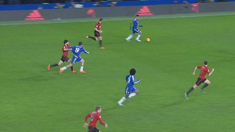Claudio Yacob (left) pulls back Diego Costa as Chelsea attack