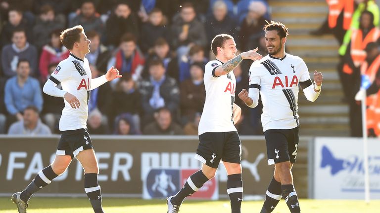 Nacer Chadli (right) celebrates after opening the scoring for Tottenham against Colchester in the FA Cup