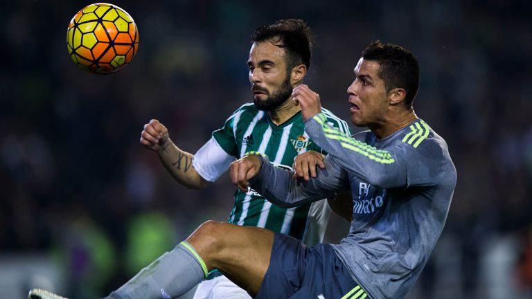 Cristiano Ronaldo competes for the ball with Francisco Molinero during Real Betis' draw with Real Madrid