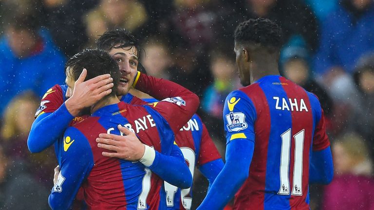 SOUTHAMPTON, ENGLAND - JANUARY 09:  Joel Ward (L) of Crystal Palace celebrates scoring his team's first goal with his team mates Yohan Cabaye (C) and Wilfr