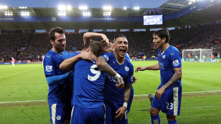 Danny Simpson celebrates with goal-scorer Jamie Vardy