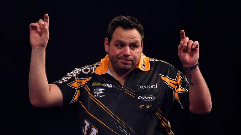 Adrian Lewis celebrates winning his semi final match during day fourteen of the William Hill PDC World Championship at Alexandra Palace, London