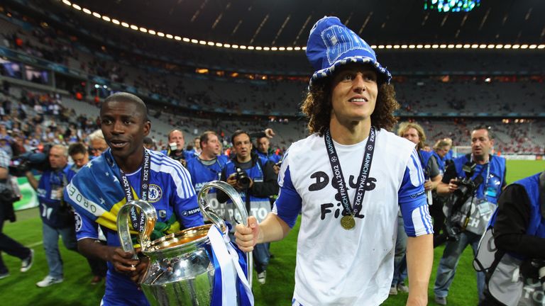 David Luiz (right) and Ramires of Chelsea celebrate with the trophy after their victory in the UEFA Champions League Final against Bayern Munich