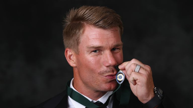 MELBOURNE, AUSTRALIA - JANUARY 27:  David Warner poses after winning the Allan Border medal at the 2016 Allan Border Medal ceremony at Crown Palladium on J