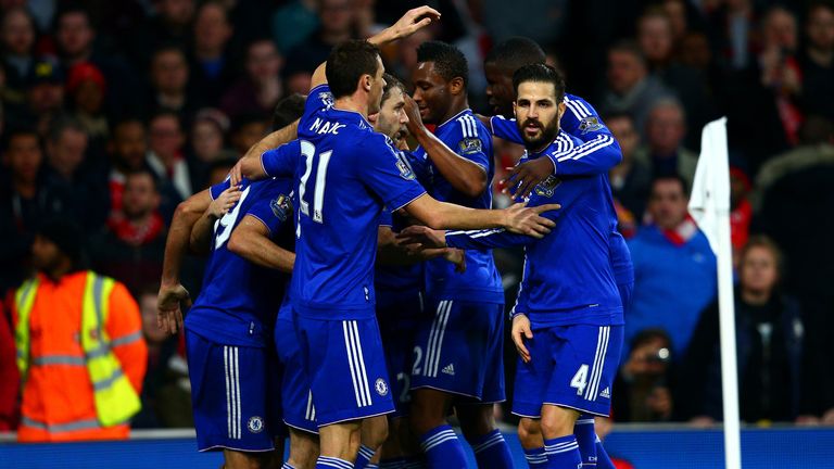 Diego Costa is congratulated after scoring for Chelsea against Arsenal