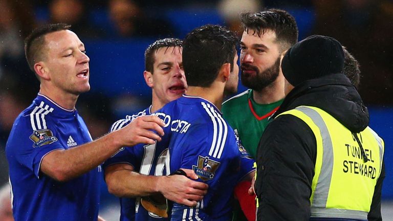 Diego Costa squares off with Boaz Myhill 