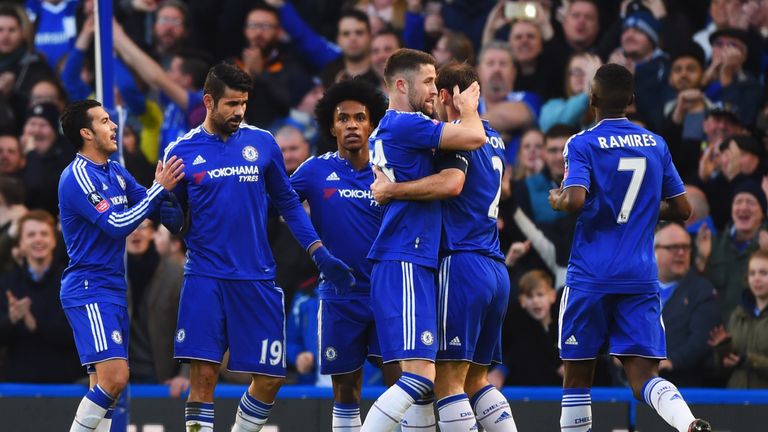 Diego Costa of Chelsea (19) celebrates with team mates as he scores their first goal during the Emirates FA Cup third round 