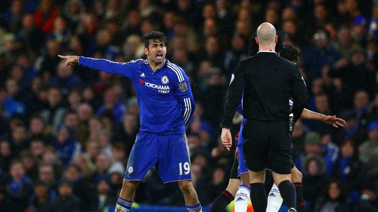Diego Costa argues with referee Anthony Taylor 