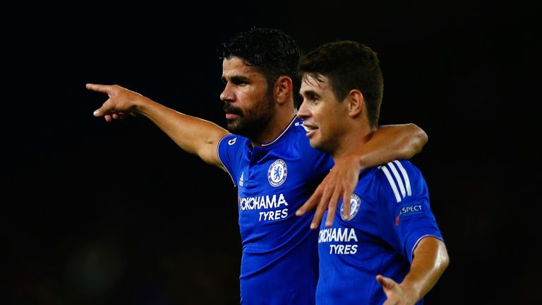  Diego Costa of Chelsea celebrates with Oscar