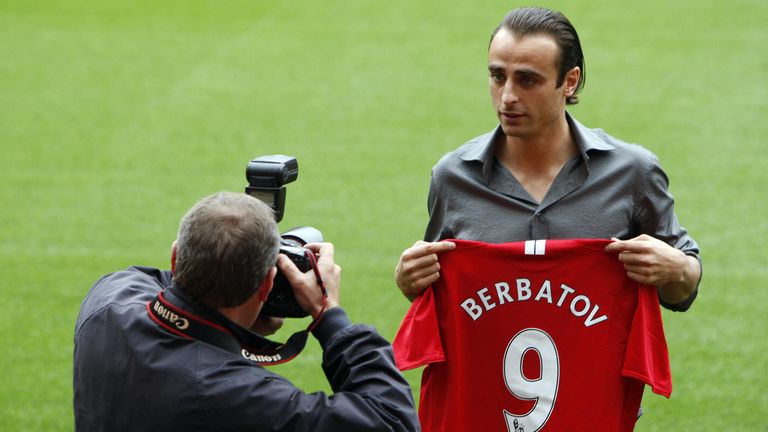Bulgaria striker Dimitar Berbatov is photographed on the Old Trafford pitch following his transfer from Tottenham Hotspur to Manchester United for 30.75 mi