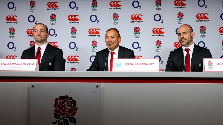 Eddie Jones (c), speaks next to Steve Borthwick (L) and Paul Gustard