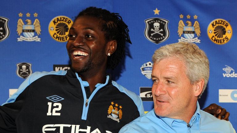 Emmanuel Adebayor and Mark Hughes in 2009