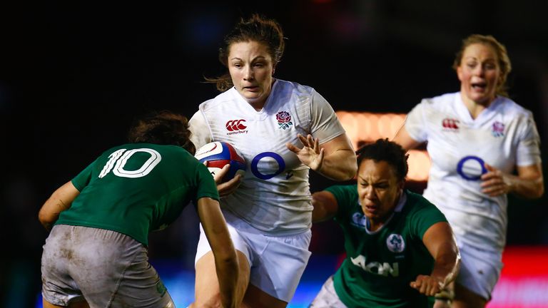 LONDON, ENGLAND - NOVEMBER 14:  Amy Cokayne of England is tackled by Sene Naoupu and Sophie Spence of Ireland during the Women's International match betwee