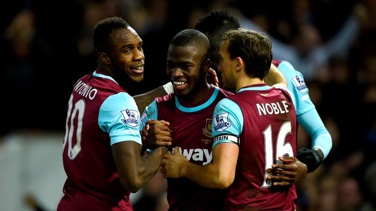 Enner Valencia (centre) celebrates with team-mates Michail Antonio (left) and Mark Noble (right) after scoring West Ham's second goal