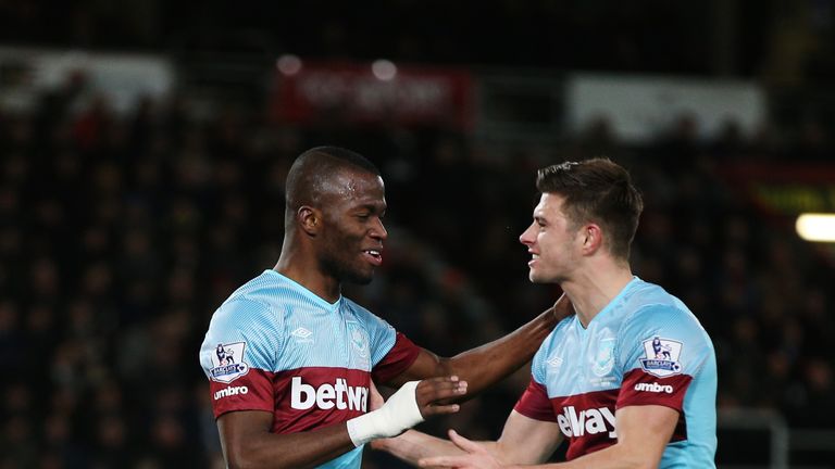 Enner Valencia of West Ham United celebrates with Aaron Cresswell (R) as he scores their second goal against Bournemouth
