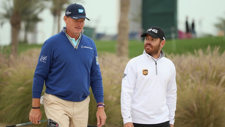 DOHA, QATAR - JANUARY 27:  (L-R) Ernie Els of South Africa and Louis Oostuizen of South Africa are pictured together on the 11th hole during the first roun