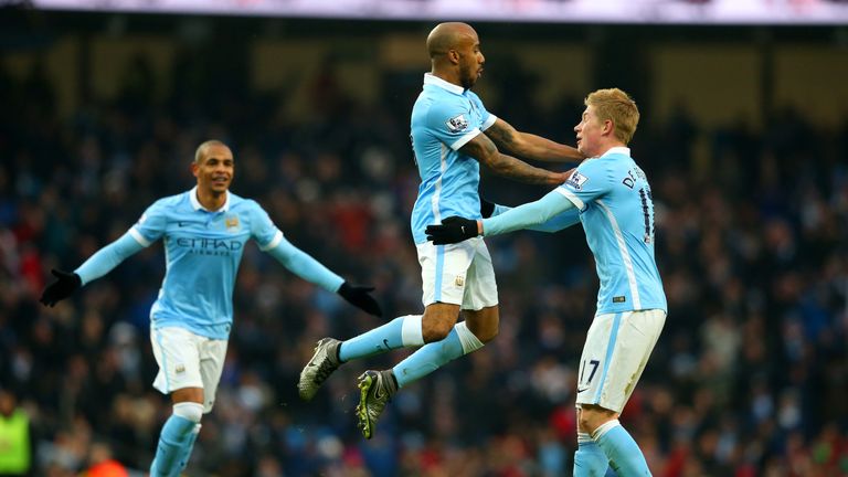 Fabian Delph of Manchester City celebrates with team-mate Kevin De Bruyne of Manchester City after scoring the opening goal 