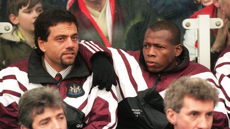 Newcastle new signing Faustino Asprilla  sits with his agent behind Kevin Keegan and Terry McDermott prior to his debut at Middlesbrough in February 1996