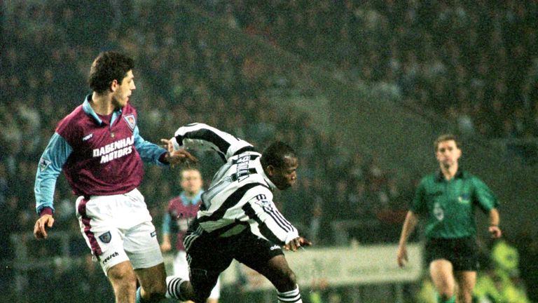 Faustino Asprilla, scorer of Newcastle's second goal, slices through the heart of the West Ham defence in March 1996