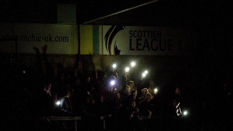 Fans as there are floodlight issues at the Scottish Cup tie