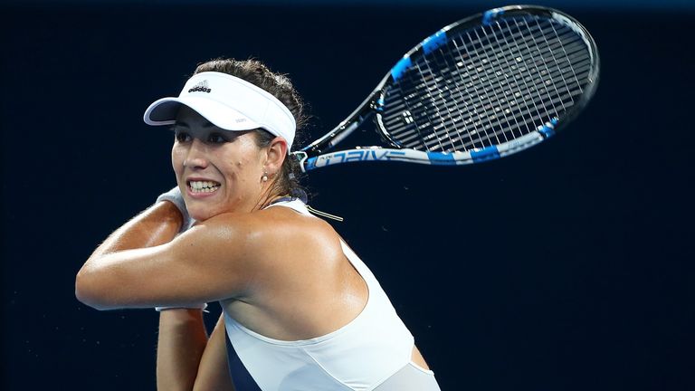 Garbine Muguruza was behind to Varvara Lepchenko when blistered feet forced her to retire in Brisbane