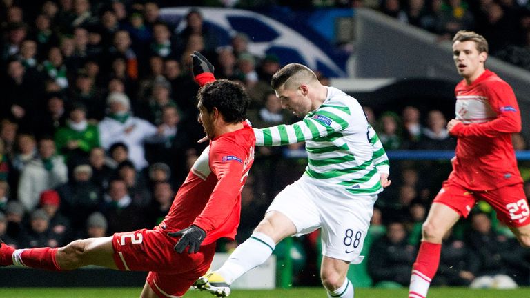 Gary Hooper scores against Spartak Moscow to earn Celtic a place in last 16 of the Champions League