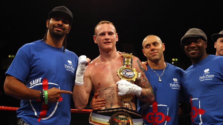George Groves with David Haye (left) and trainer Adam Booth after Groves' second-round knockout of Paul Smith, November 2011