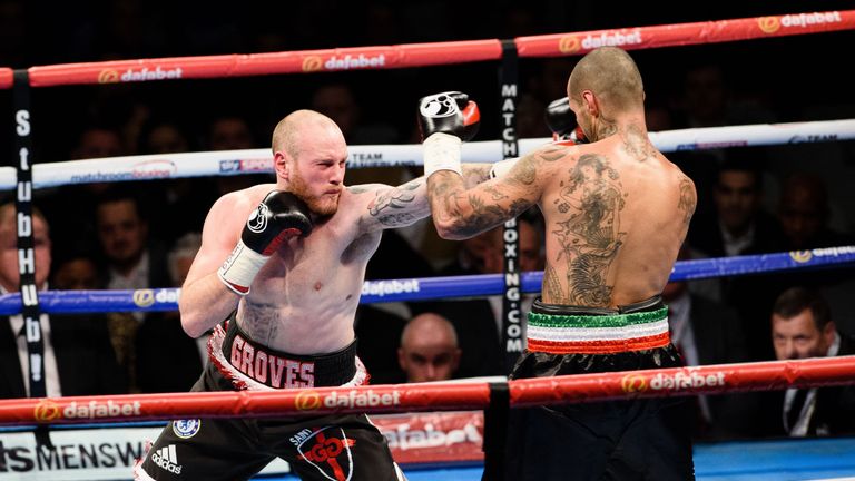 British boxer George Groves (L) vies against Italian boxer Andrea Di Luisa during their International Super-Middleweight contest in east London