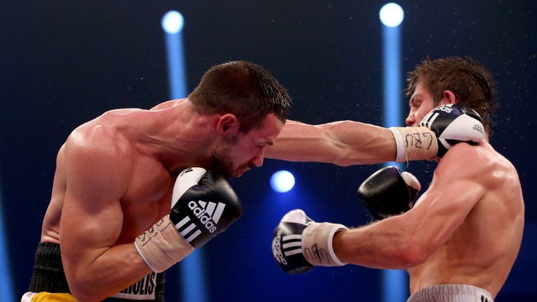 OFFENBURG, GERMANY - JANUARY 09:  Vincent Feigenbutz (R) of Germany exchange punches with Giovanni De Carolis of Italy