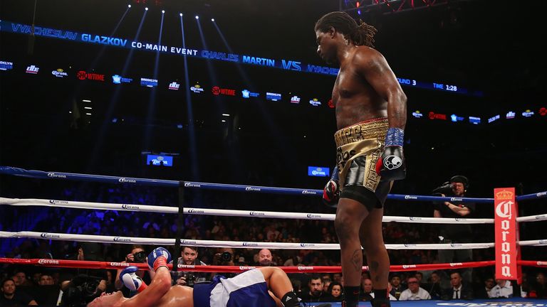 Charles Martin celebrates TKO's Vyacheslav Glazkov in the second round to win the IBF World Heavyweight Championship 