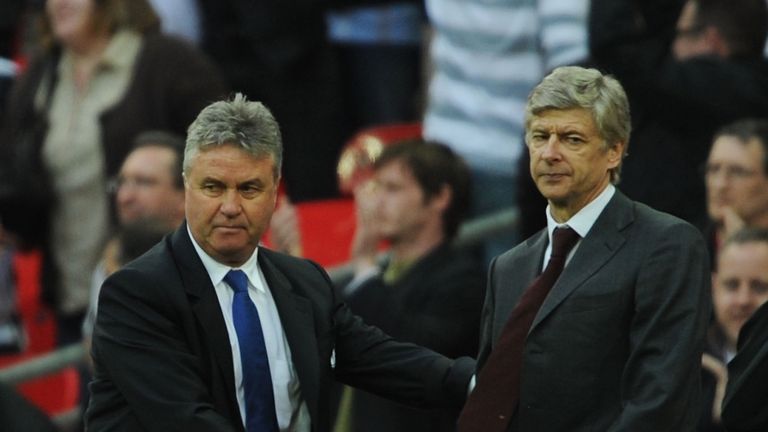 LONDON - APRIL 18:  Arsene Wenger manager of Arsenal shakes hands with Guus Hiddink manager of Chelsea after the FA Cup sponsored by E.ON Semi Final match 