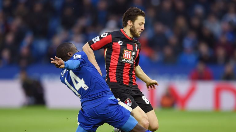 Harry Arter of Bournemouth and Ngolo Kante of Leicester City compete for the ball