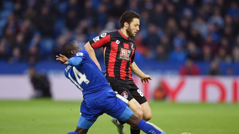 Harry Arter of Bournemouth and Ngolo Kante of Leicester City compete for the ball