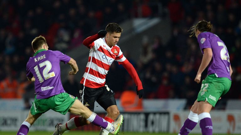 Harry Forrester (middle) in has signed for Rangers from Doncaster Rovers 