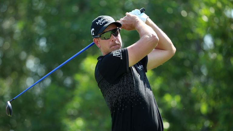 Henrik Stenson of Sweden tees off on the 5th hole during round four of the Abu Dhabi HSBC Golf Championship a