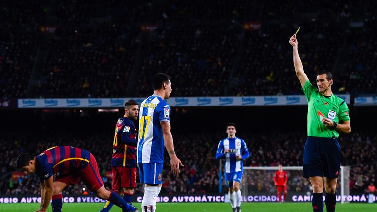 Hernan Perez  is shown a second yellow card for a challenge on Jordi Alba