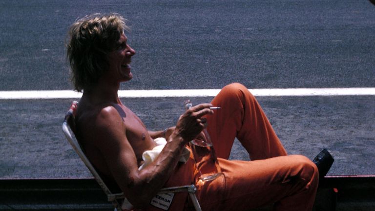 Hunt relaxes by the side of the track ahead of the 1973 French GP at Paul Ricardn