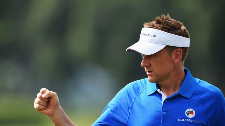 KUALA LUMPUR, MALAYSIA - JANUARY 15:  Ian Poulter of team Europe pumps his fist during the first day's fourball matches at the EurAsia Cup presented by DRB