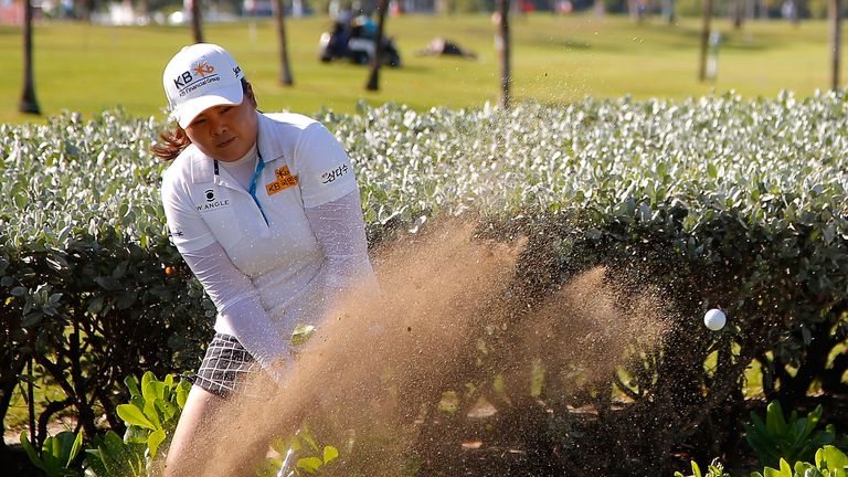 PARADISE ISLAND, BAHAMAS - JANUARY 28:  Inbee Park of South Korea chips out of the bushes on the seventh hole during the first round of the Pure Silk Baham