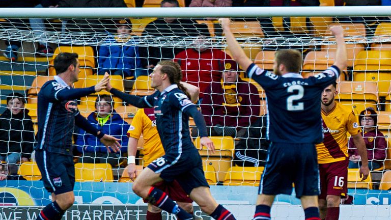 Jackson Irvine, second left, runs away after scoring against Motherwell at Fir Park