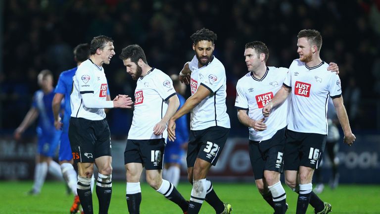 Jacob Butterfield (2nd L) of Derby County celebrates scoring his team's first goal 