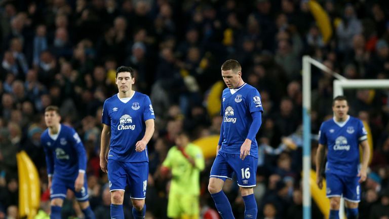 Everton's James McCarthy and Gareth Barry look dejected after conceding a third goal during the Capital One Cup, semi final, second leg 