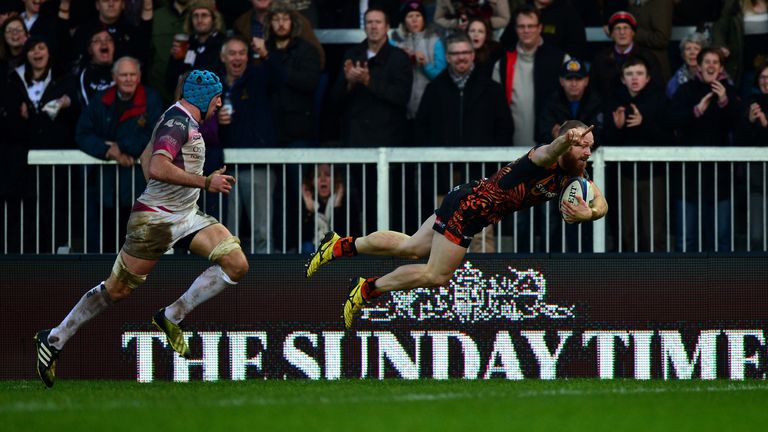  James Short of Exeter Chiefs dives over to score his side's third try